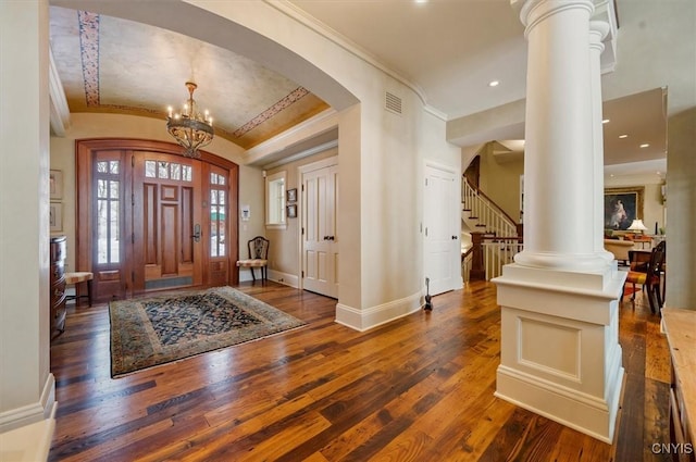 3789 State Route 12, Kirkland, NY 13323 - foyer entrance with decorative columns, visible vents, baseboards, ornamental molding, and hardwood / wood-style floors