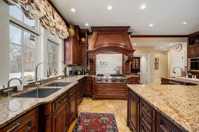 3789 State Route 12, Kirkland, NY 13323 - kitchen featuring decorative backsplash, custom range hood, stainless steel gas cooktop, a sink, and recessed lighting