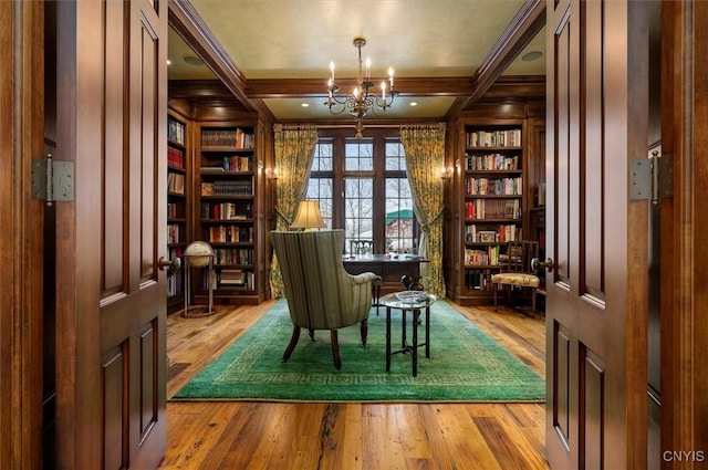 3789 State Route 12, Kirkland, NY 13323 - living area with built in features, beam ceiling, and hardwood / wood-style flooring
