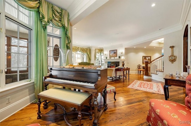 3789 State Route 12, Kirkland, NY 13323 - sitting room with hardwood / wood-style flooring, a fireplace, baseboards, ornamental molding, and stairway