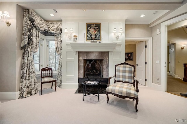 3789 State Route 12, Kirkland, NY 13323 - living area with carpet floors, baseboards, crown molding, and a tiled fireplace