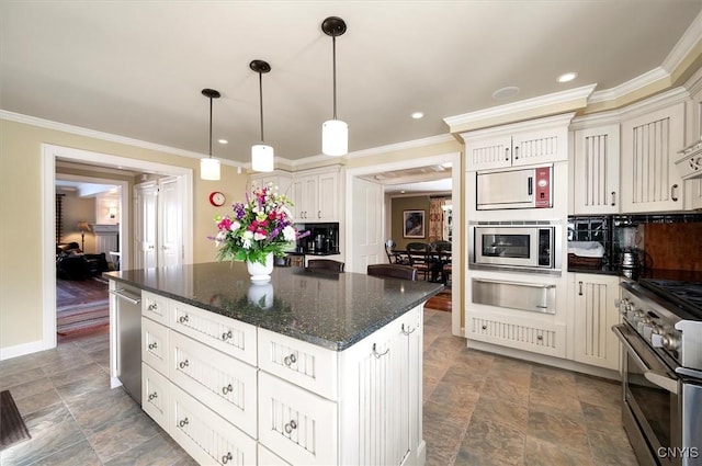 3789 State Route 12, Kirkland, NY 13323 - kitchen with appliances with stainless steel finishes, a warming drawer, crown molding, a kitchen island, and hanging light fixtures