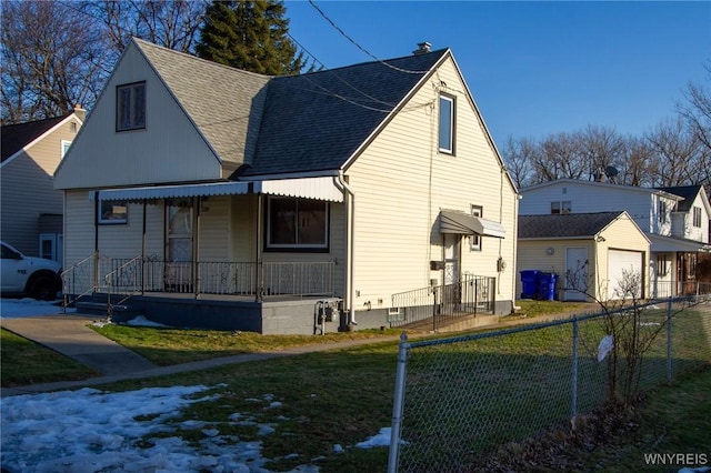 view of front of house featuring a garage, covered porch, a shingled roof, fence, and a front lawn