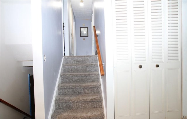 stairway with baseboards