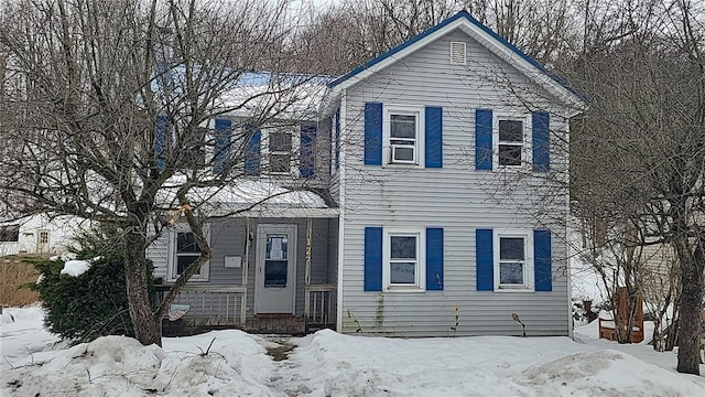 view of front of house featuring cooling unit