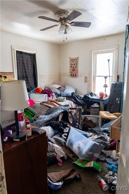 miscellaneous room with a ceiling fan