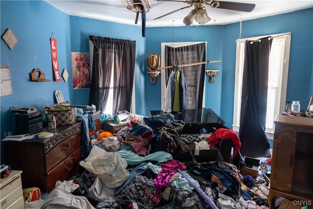 bedroom featuring ceiling fan