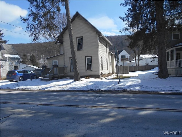 view of front of home with fence