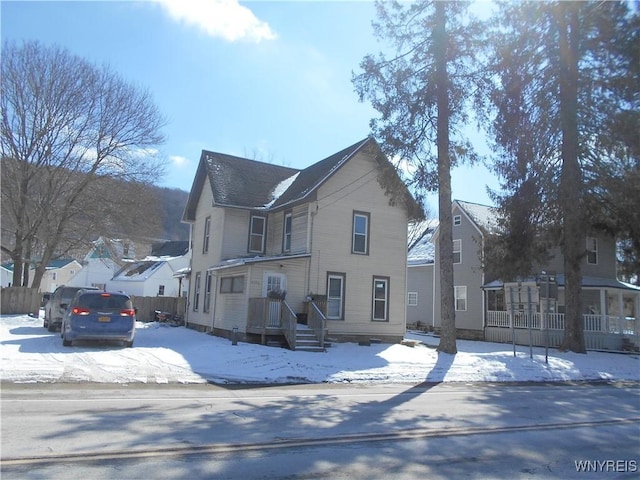 view of front of property with fence