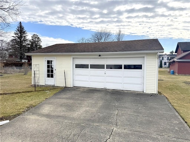 detached garage with fence