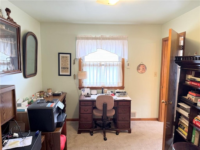 home office with carpet floors, visible vents, and baseboards