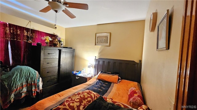 bedroom featuring ceiling fan