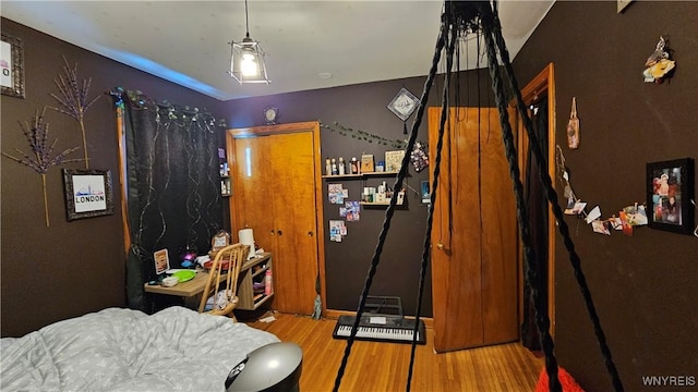 bedroom featuring wood finished floors