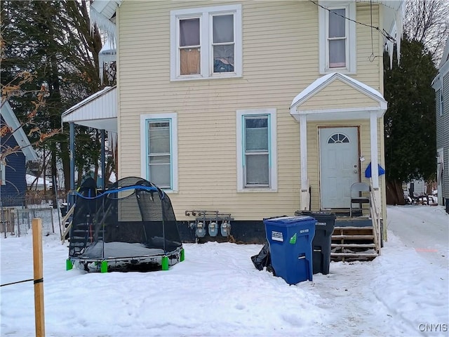 view of front of property featuring a trampoline