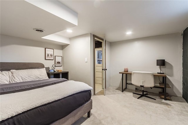 bedroom with recessed lighting, visible vents, and light colored carpet