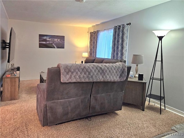 living room featuring light carpet and baseboards