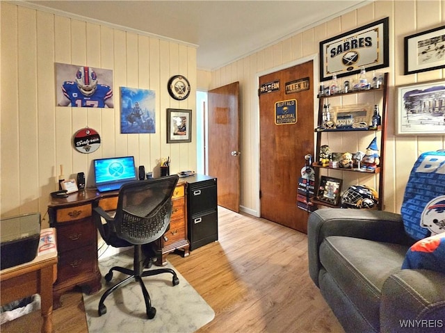 office area featuring crown molding and light wood finished floors