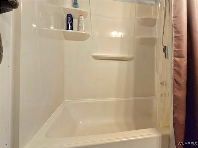 full bathroom with shower / tub combo