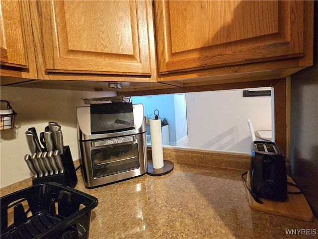 room details featuring brown cabinetry