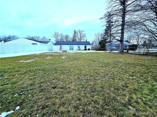 view of yard featuring fence