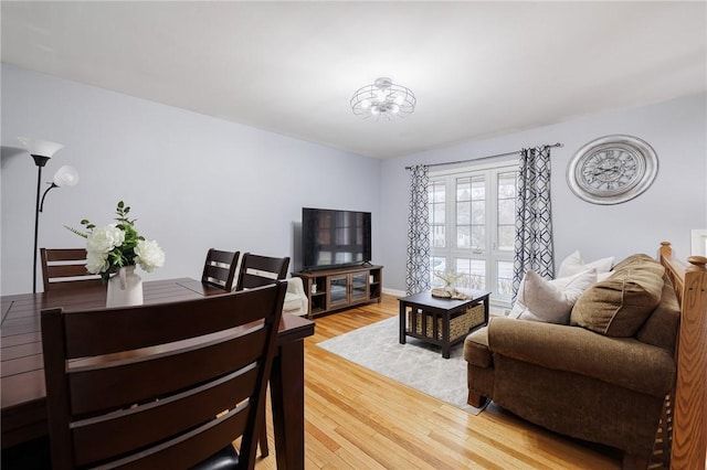 living area with light wood-style floors