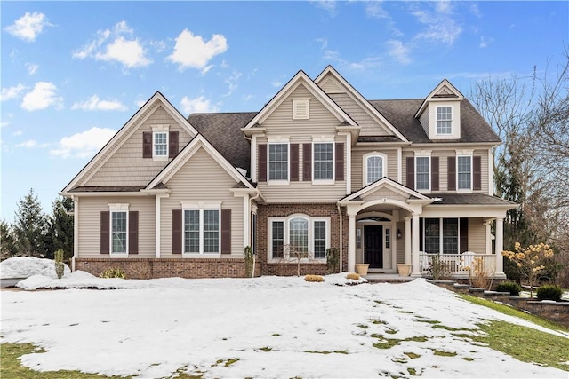 view of front of house with brick siding