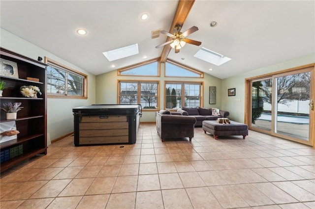 living area featuring a healthy amount of sunlight and light tile patterned floors