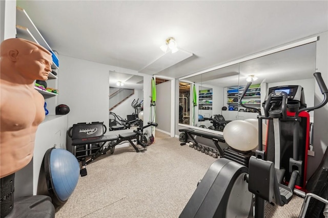 workout area with carpet floors