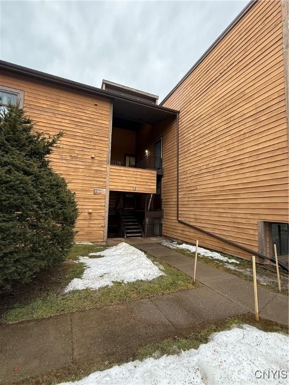 view of home's exterior featuring a balcony