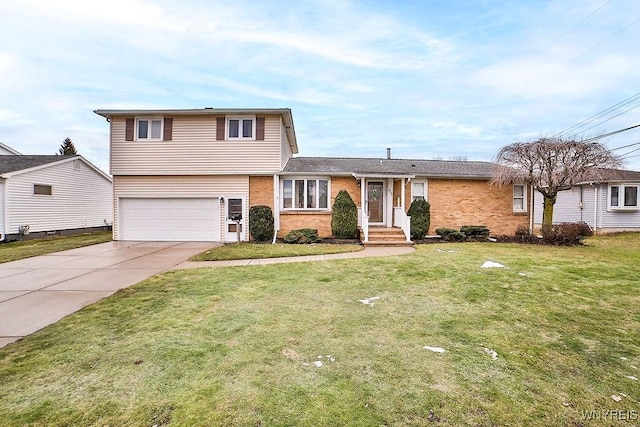 tri-level home with driveway, an attached garage, a front yard, and brick siding