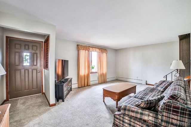 living room with baseboard heating, light colored carpet, and baseboards