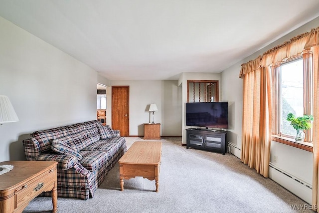 living room featuring a baseboard radiator and light colored carpet