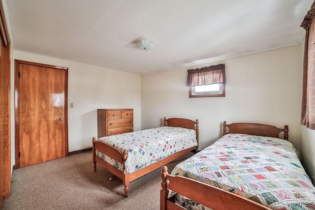 carpeted bedroom featuring ornamental molding