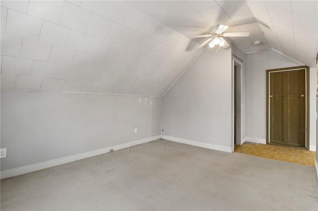 additional living space with lofted ceiling, ceiling fan, and baseboards