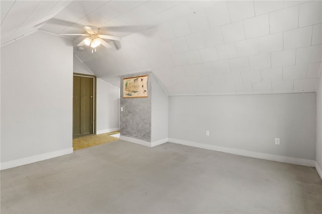 bonus room featuring lofted ceiling, ceiling fan, and baseboards