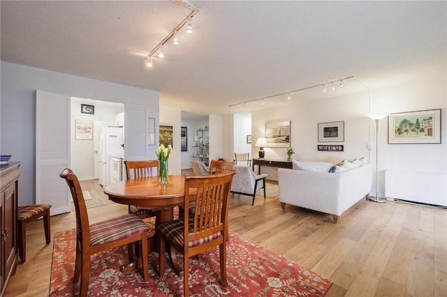 dining room featuring light wood-type flooring