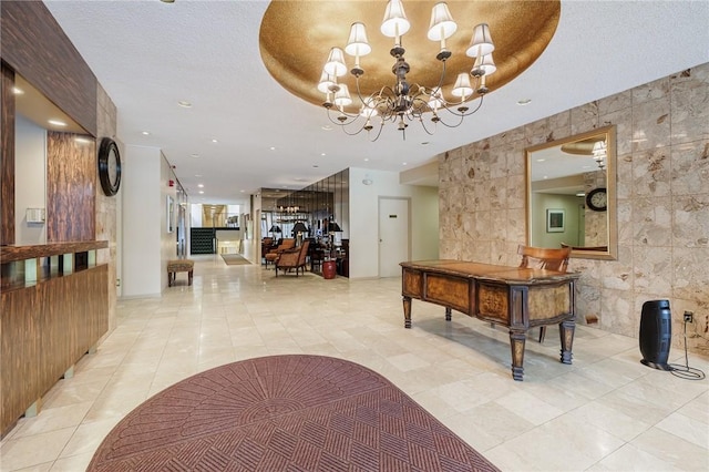 welcome area with a chandelier