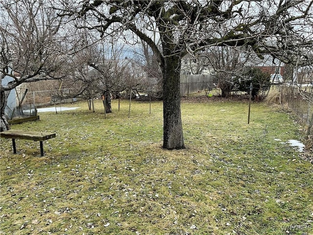 view of yard with fence