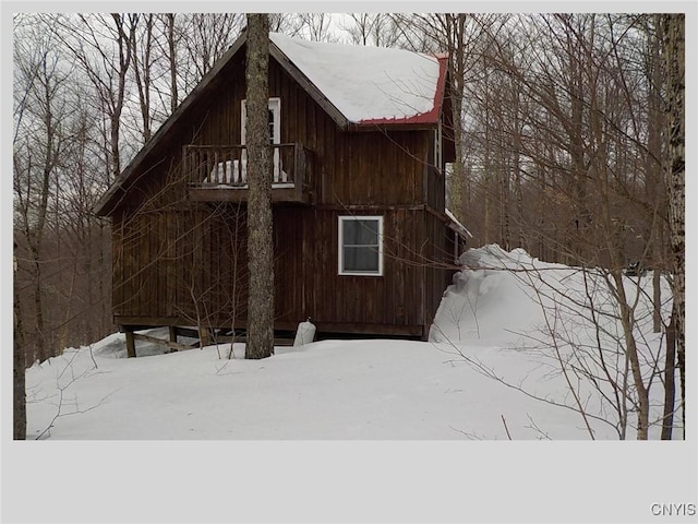 view of snow covered property