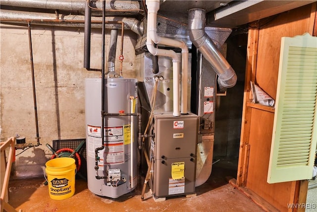 utility room featuring gas water heater