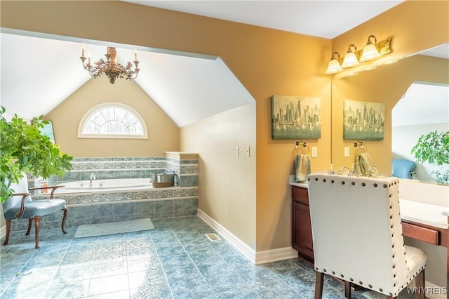 full bathroom featuring baseboards, tile patterned flooring, vaulted ceiling, vanity, and a bath