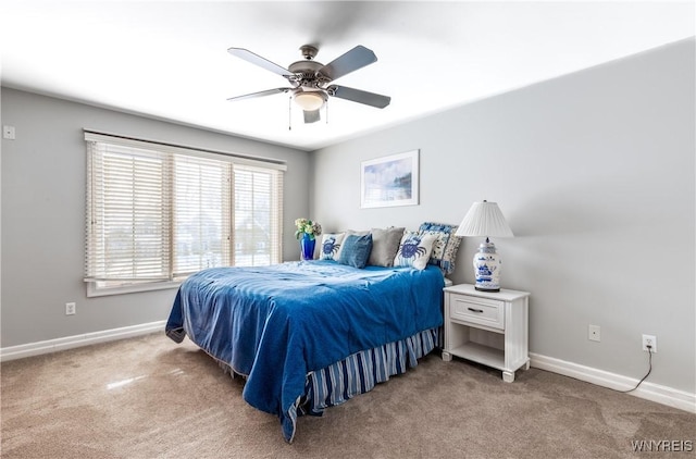 bedroom featuring carpet floors, ceiling fan, and baseboards