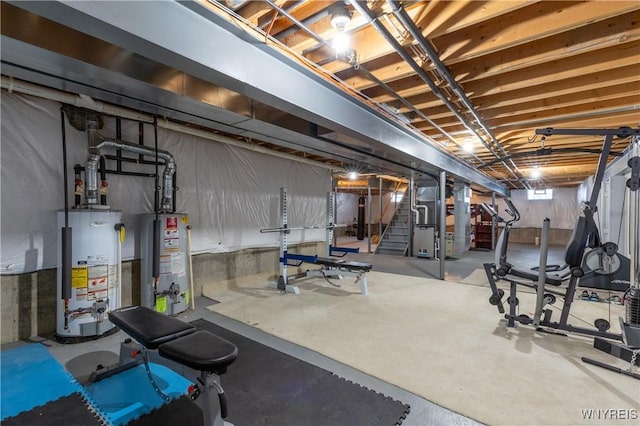 workout area featuring gas water heater