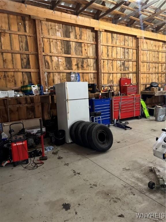 garage featuring freestanding refrigerator