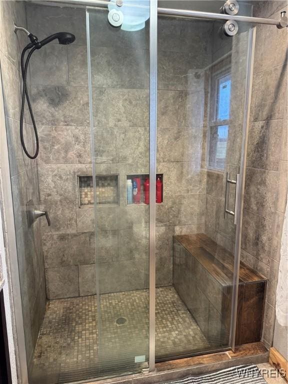 bathroom with a stall shower