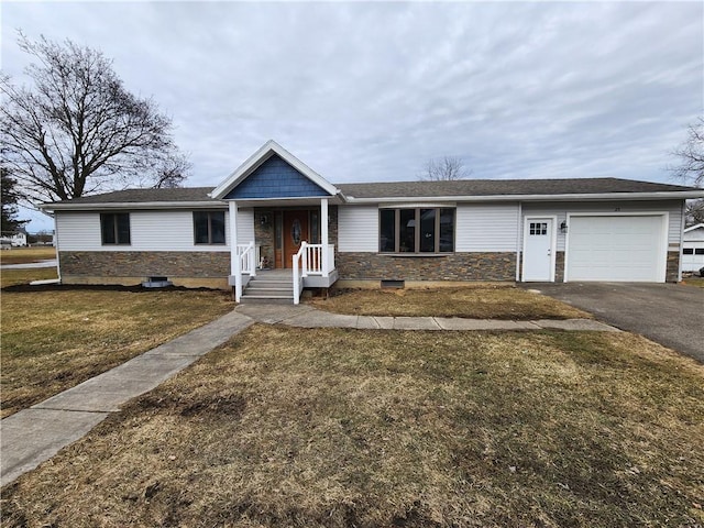 ranch-style house with a front yard, driveway, and an attached garage