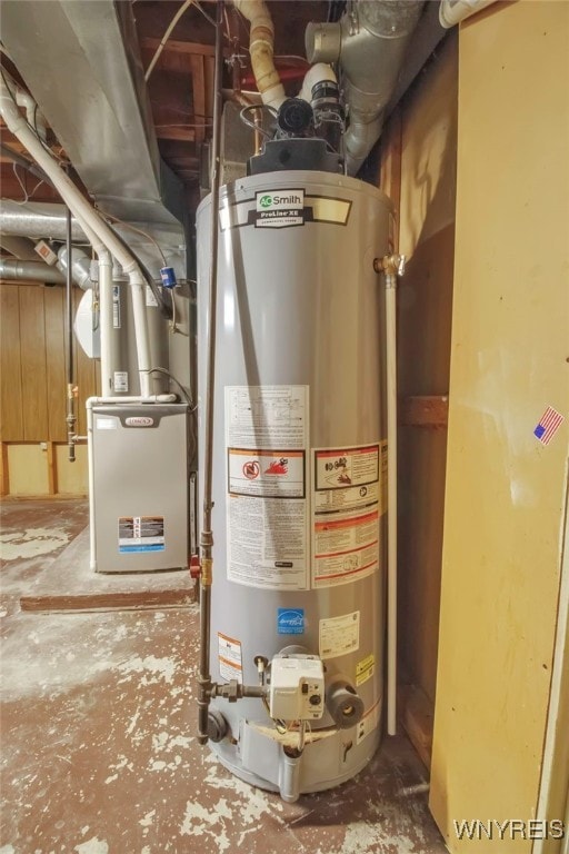 utility room featuring water heater