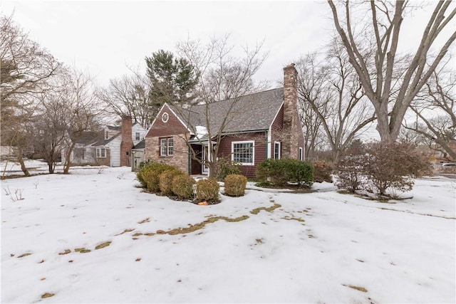 view of front of property with a chimney