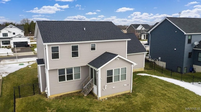 12 Kevwood Ln, Lancaster, NY 14086 - rear view of property featuring a yard, fence, and a residential view