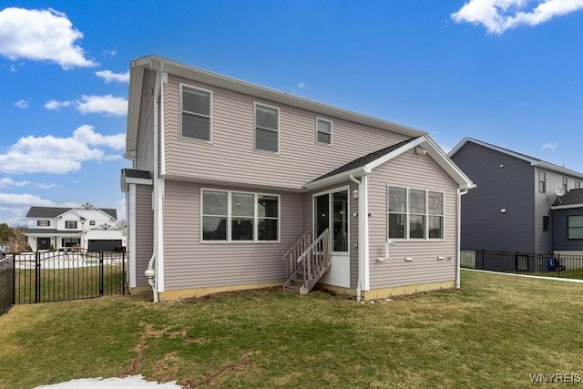 12 Kevwood Ln, Lancaster, NY 14086 - back of house featuring a lawn, a gate, entry steps, and fence private yard